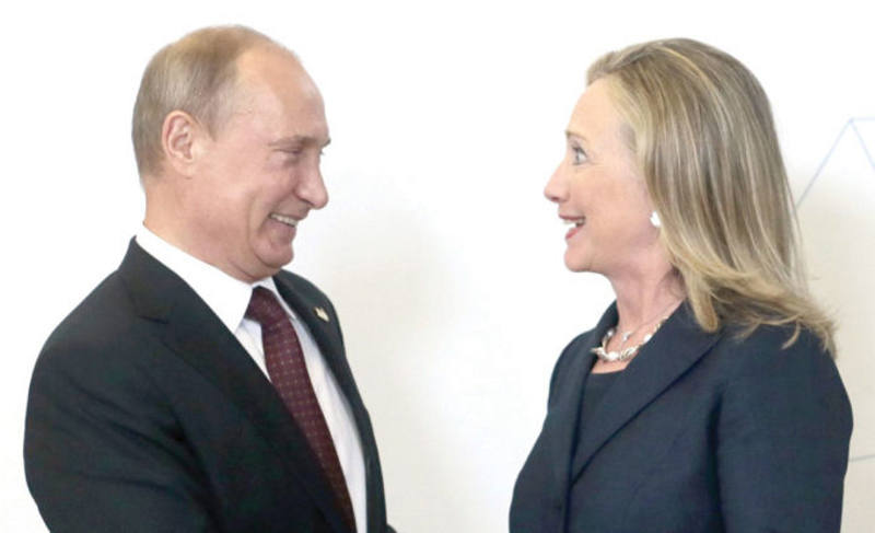 Vladimir Puttin e Hillary Clinton